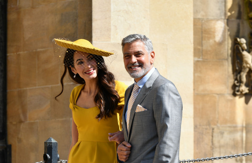 George Clooney plays bar man at Royal wedding reception