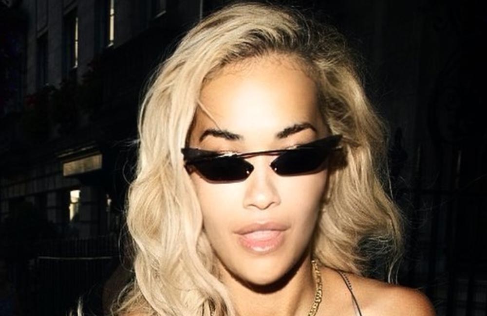 Rita Ora poses topless on Instagram