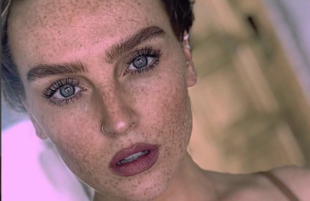 Perrie Edwards is embracing her freckles in latest Instagram pic