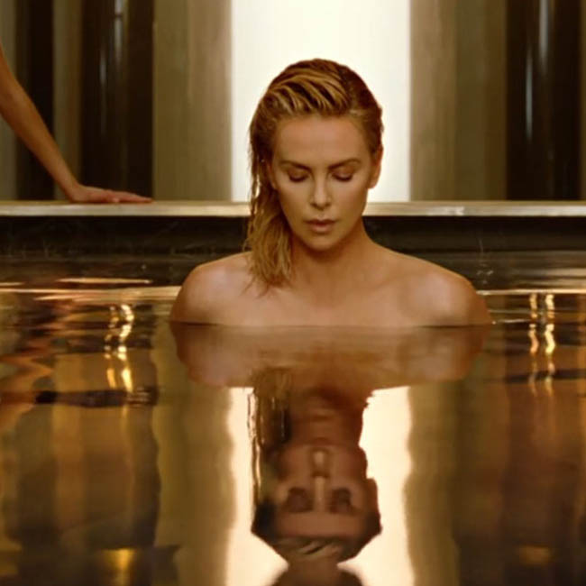 Charlize Theron strips for new Dior fragrance ad promoting J’adore Absolu