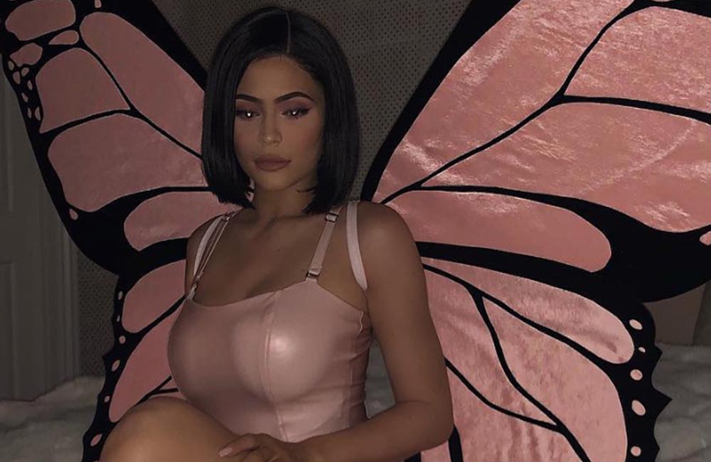 Kylie Jenner poses in nude Halloween costume