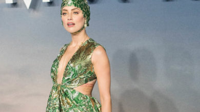 Amber Heard wears swimming cap to the Aquaman premiere