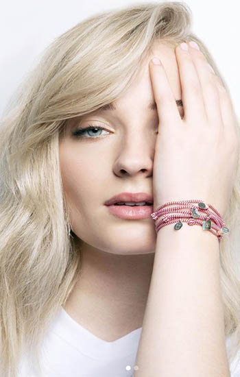 Game of Thrones star Sophie Turner wearing her Louis Vuitton bracelet in aide of UNICEF