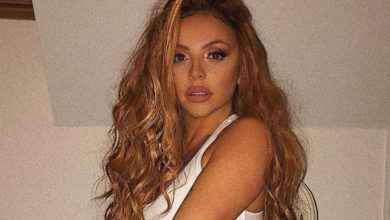 Jesy Nelson strips to her undies to annoy Piers Morgan