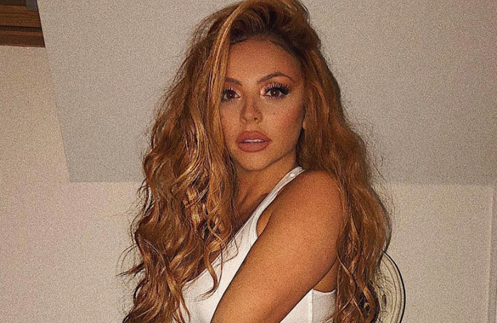 Jesy Nelson strips to her undies to annoy Piers Morgan