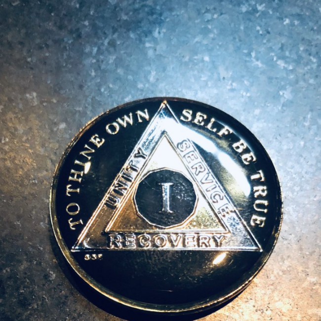 Black coin awarded to Charlie Sheen by Alcoholics Anonymous