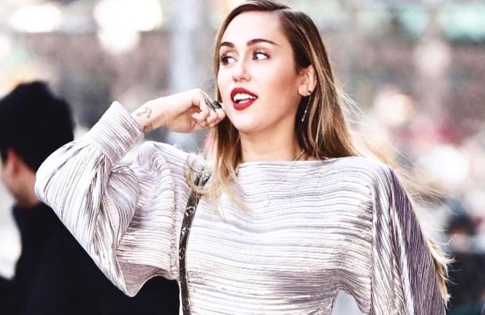 Miley Cyrus shows off her new vegan Converse fashion line