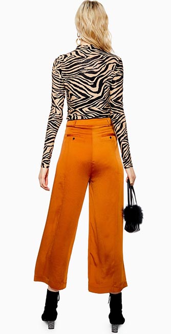 Rear view of these wide trousers by Native Youth from Topshop