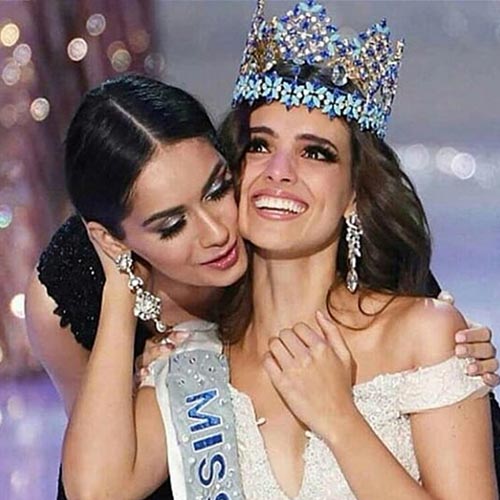 Vanessa Ponce de Leon receives her crown from last years winner Manushi Chhillar from India